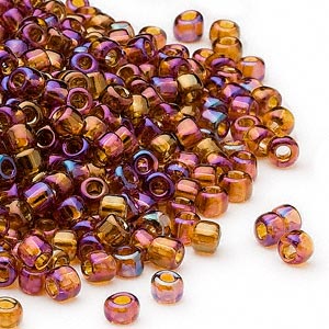 #6 Seed Bead - Transparent Amber, rainbow-finish